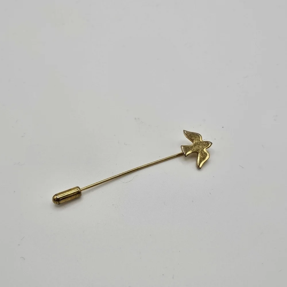 gold tone stick pin with dove